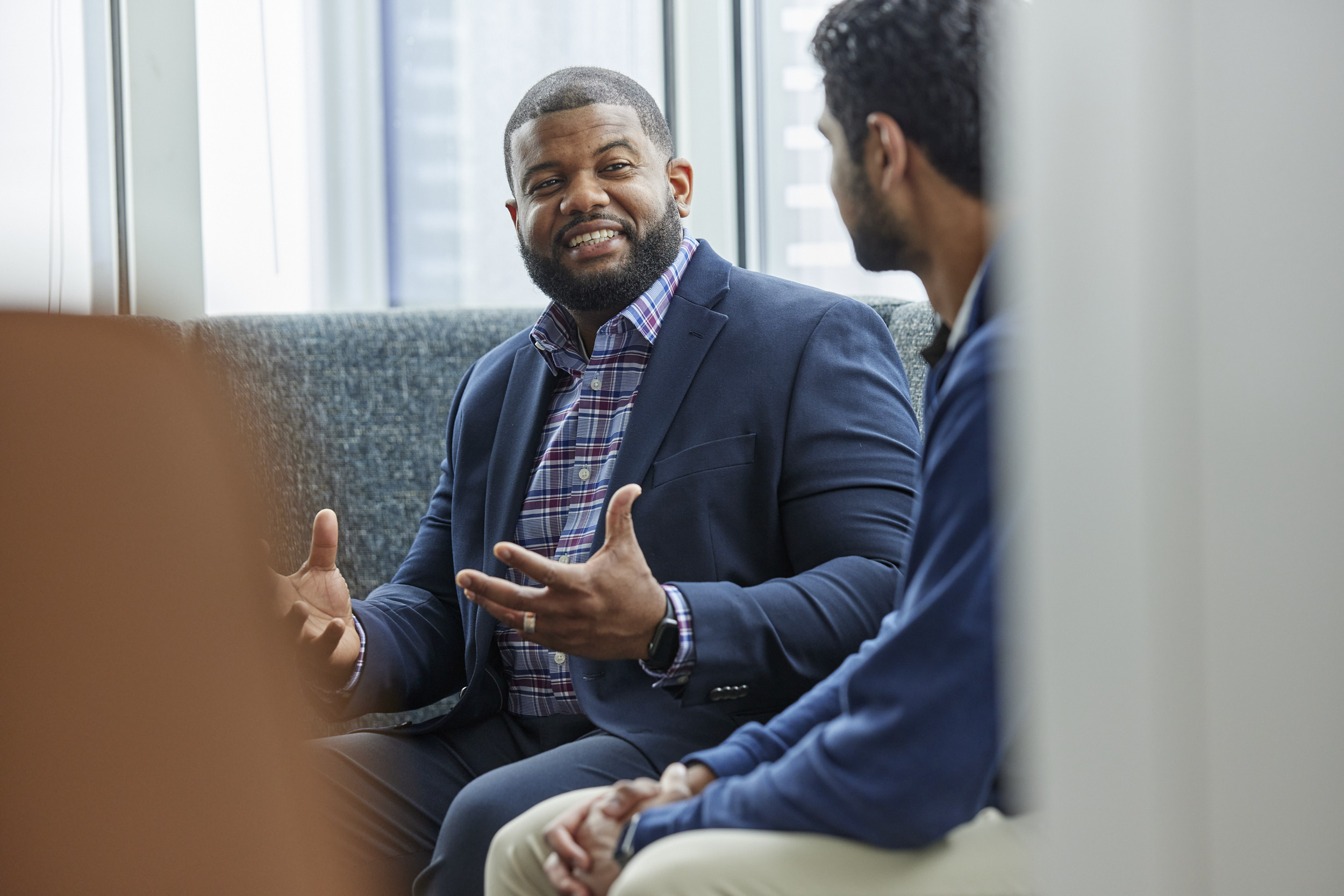 two men in conversation